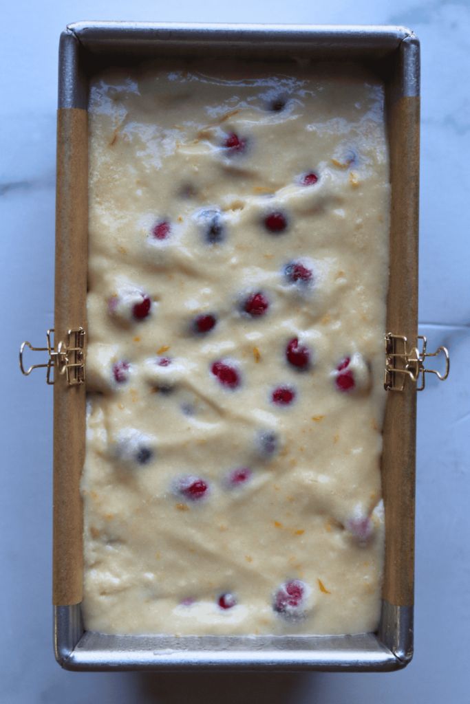 Gently fold in the fresh cranberries, being careful not to overmix the batter, as this can result in a dense quick bread.