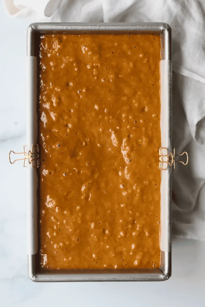 Pour the quick bread batter into the prepared loaf pan and bake for 50-60 minutes, or until a toothpick put in the center comes out clean or with a few moist crumbs. 